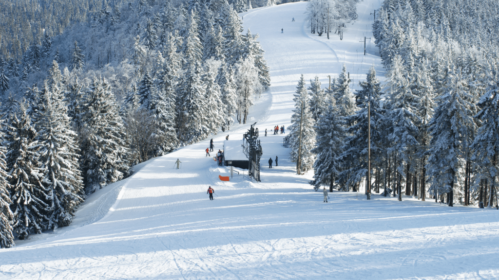 Image of skiers donw the mountain at kelly canyon ski resort