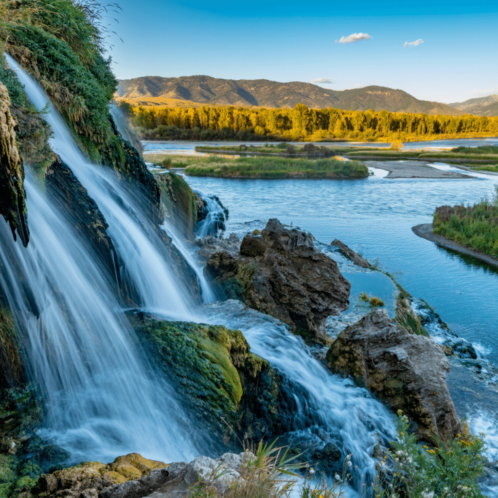 Image of falls flowing over rocks into southfork of Snake river in Swan Valley Idaho